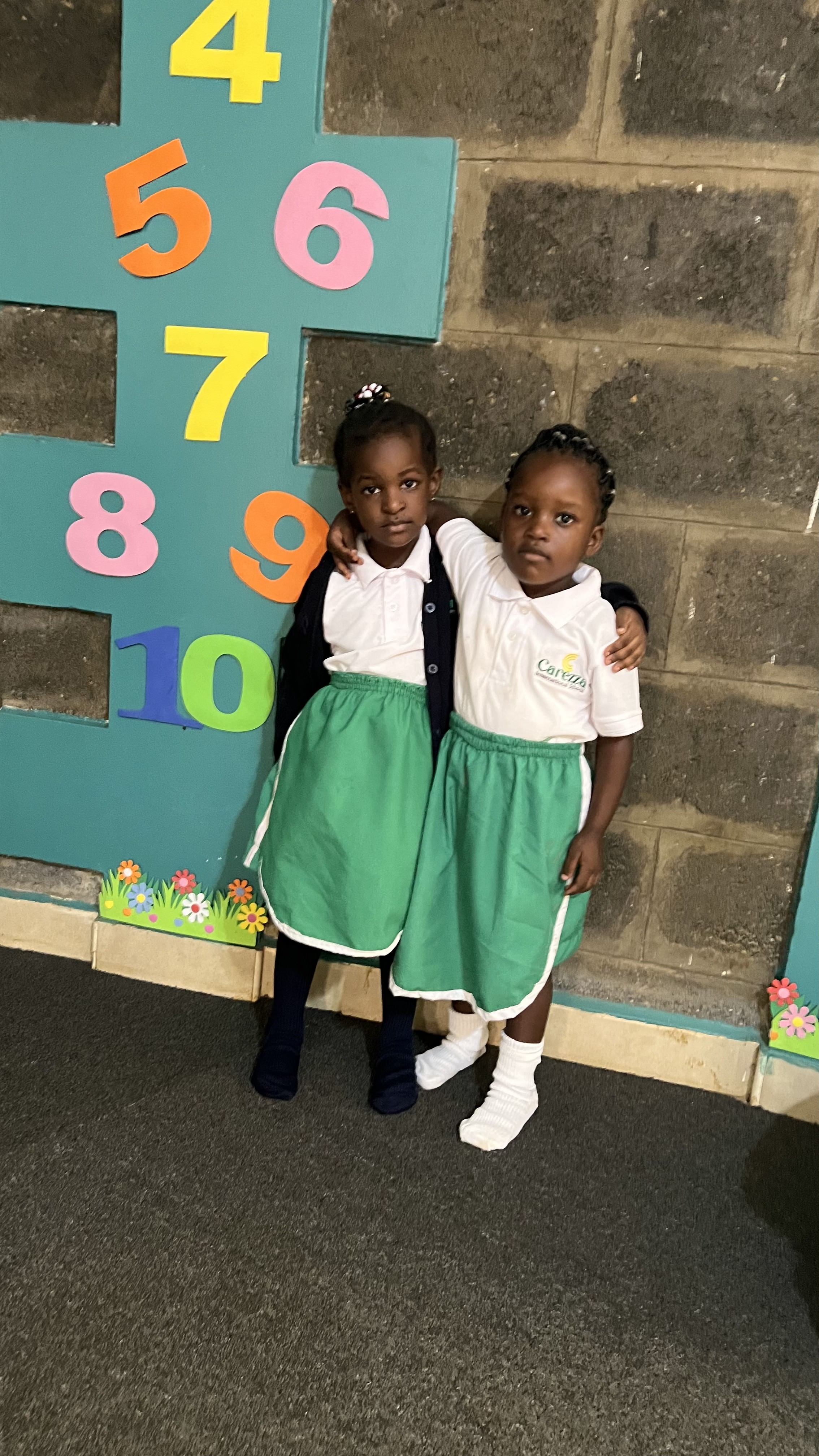 Children laughing and learning together at Carezza International School